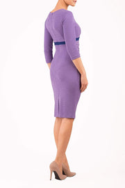 A model wearing pencil marvel stretch dress with 3/4 sleeves from Diva Catwalk
