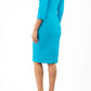 blond model wearing diva catwalk nashville plain pencil skirt dress with sleeves and square neckline and Empire waistline in azure blue colour side