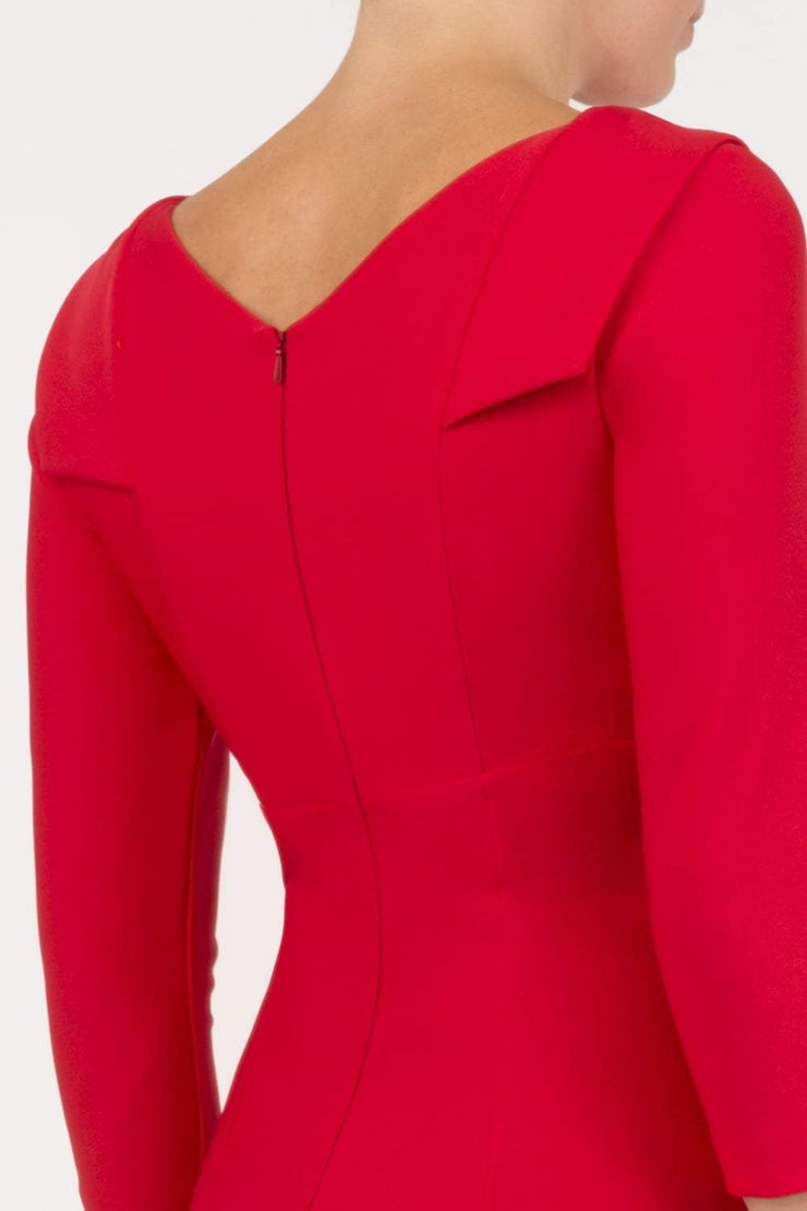 model wearing diva catwalk york pencil-skirt dress with sleeves and rounded folded collar and plearing across the tummy area in electric red colour back