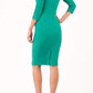 model wearing diva catwalk york pencil-skirt dress with sleeves and rounded folded collar and plearing across the tummy area in emerald green colour back