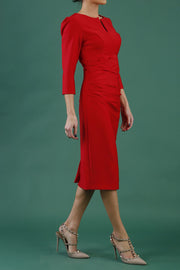 model is wearing diva catwalk seed fitzrovia sleeved pencil dress in salsa red back