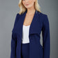 brunette model wearing Diva Catwalk Fulica Long Sleeve One Button Oversized Collar Jacket in navy with diva trousers front