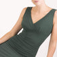 Model wearing the Diva Banbury gathered dress in bodycon pencil dress design in deep green front image Sheath Dress