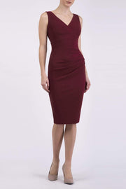 Model wearing the Diva Banbury gathered dress in bodycon pencil dress design in cabaret burgundy front