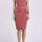 brunette model is wearing diva catwalk velvet pencil dress with V-neck and wrap skirt in mahogany pink front