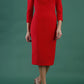 model is wearing diva catwalk kelso sleeved pencil dress with shoulder cut out and rounded high neck in electric red front
