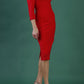 model is wearing diva catwalk kelso sleeved pencil dress with shoulder cut out and rounded high neck in electric red front