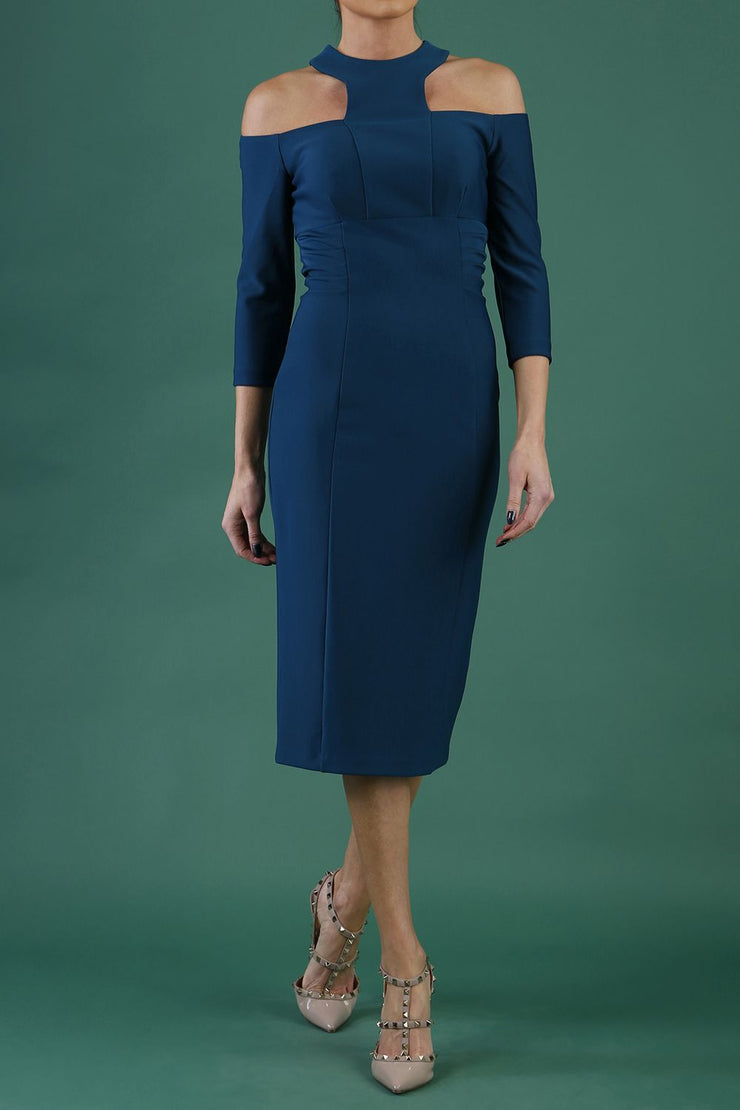 model is wearing diva catwalk kelso sleeved pencil dress with shoulder cut out and rounded high neck in glorious teal front