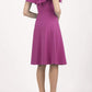 model wearing diva catwalk layla swing dress with bardot frill neckline in fuchsia pink back