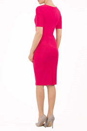 model is wearing diva catwalk lydia short sleeve pencil fitted dress in pink colour with rounded neckline with a slit in the middle back