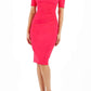 blonde model is wearing diva catwalk lydia short sleeve pencil fitted dress in paradise pink colour with rounded neckline with a slit in the middle front