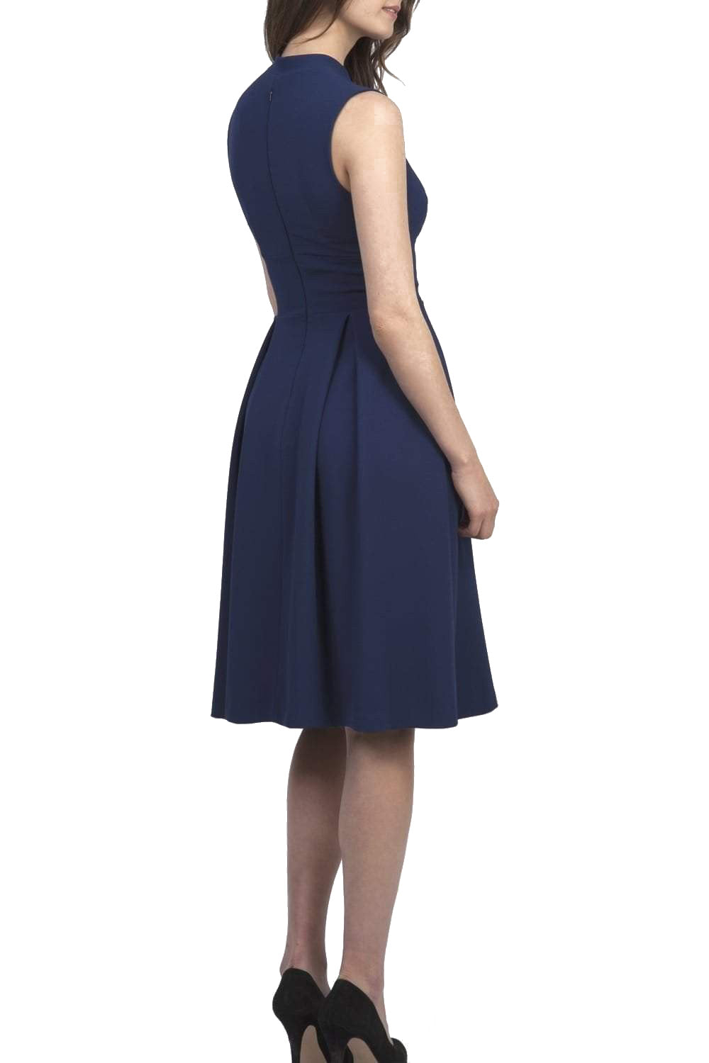 brunette model wearing diva catwalk oceana a-line swing skirt sleeveless dress with funnel neckline and tie detail in navy blue back