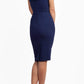 brunette model is wearing diva catwalk odessa pencil sleeveless dress with frill detail on rounded neckline in navy back