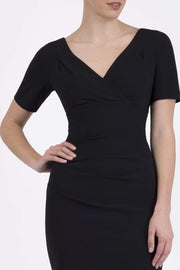 Model wearing the Diva Opal dress in pencil dress design in black front image