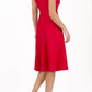 model wearing diva catwalk rochelle swing skirt a line dress without sleeves with a low v neck in red back