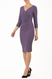 Model wearing the Diva Chelsea Pencil dress with V neckline and three-quarter sleeves in dark mauve front image
