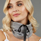 blonde model is wearing diva catwalk rappa soft neck warmer in grey front