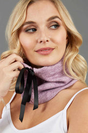 blonde model is wearing diva catwalk rappa soft neck warmer in pink front