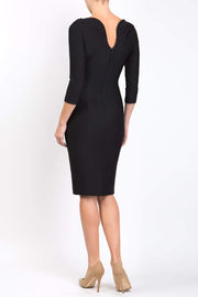 Model wearing the Seed Agatha in pencil dress design in black back image