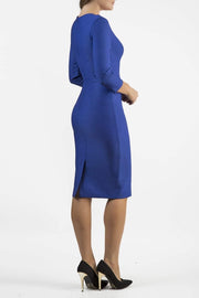 model is wearing seed rowena pencil dress with sleeves and square neckline in monaco blue side