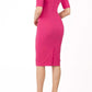 model is wearing diva catwalk solway pencil dress cold shoulder detail and rounded neckline in pink back