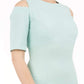 model is wearing diva catwalk solway pencil dress cold shoulder detail and rounded neckline in mint green front close up