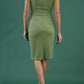 brunette model wearing Diva catwalk Suzy pencil sleeveless dress with v-neckline and wide wasteland in dill green back
