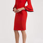 blonde model wearing diva catwalk tina pencil skirt dress with rounded neckline and flute sleeve in electric red front